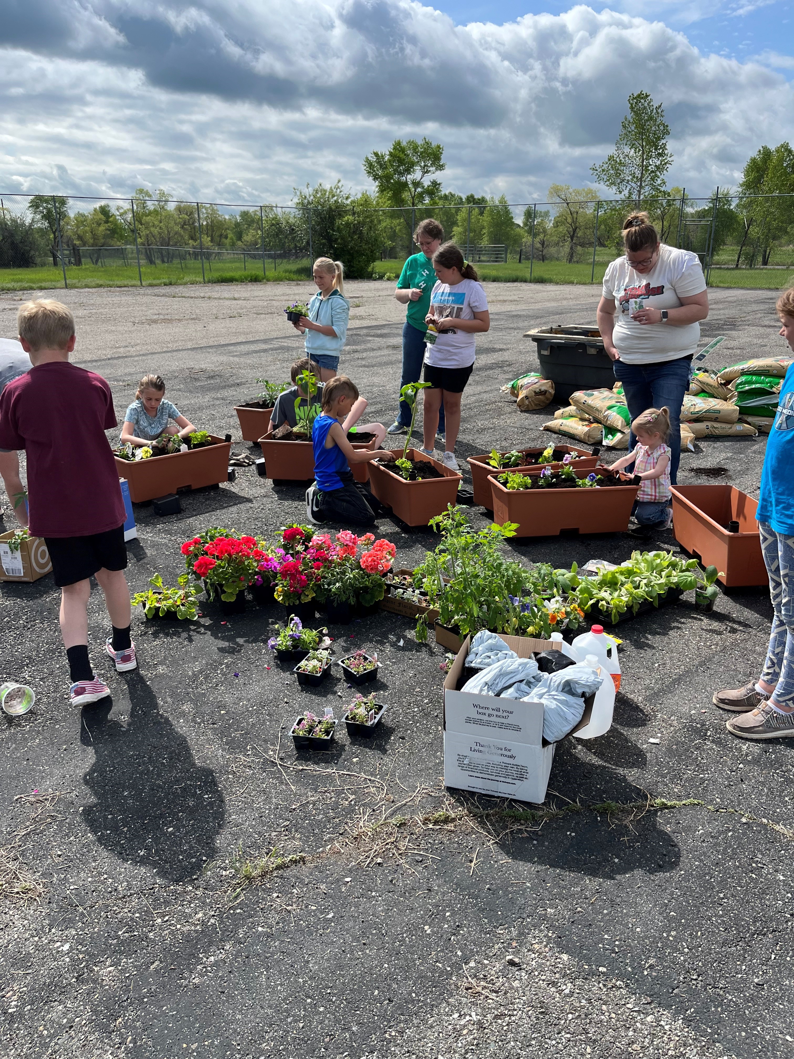 Youth working in 4-H garden